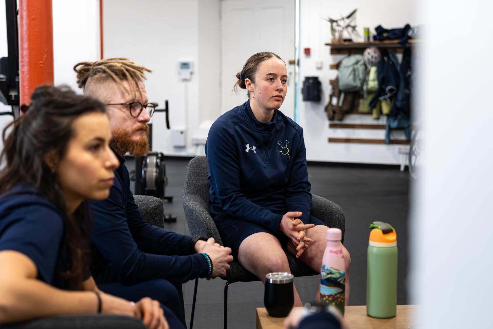 Health by Science team members collaborating on multidisciplinary patient care plans for personal training Edinburgh.