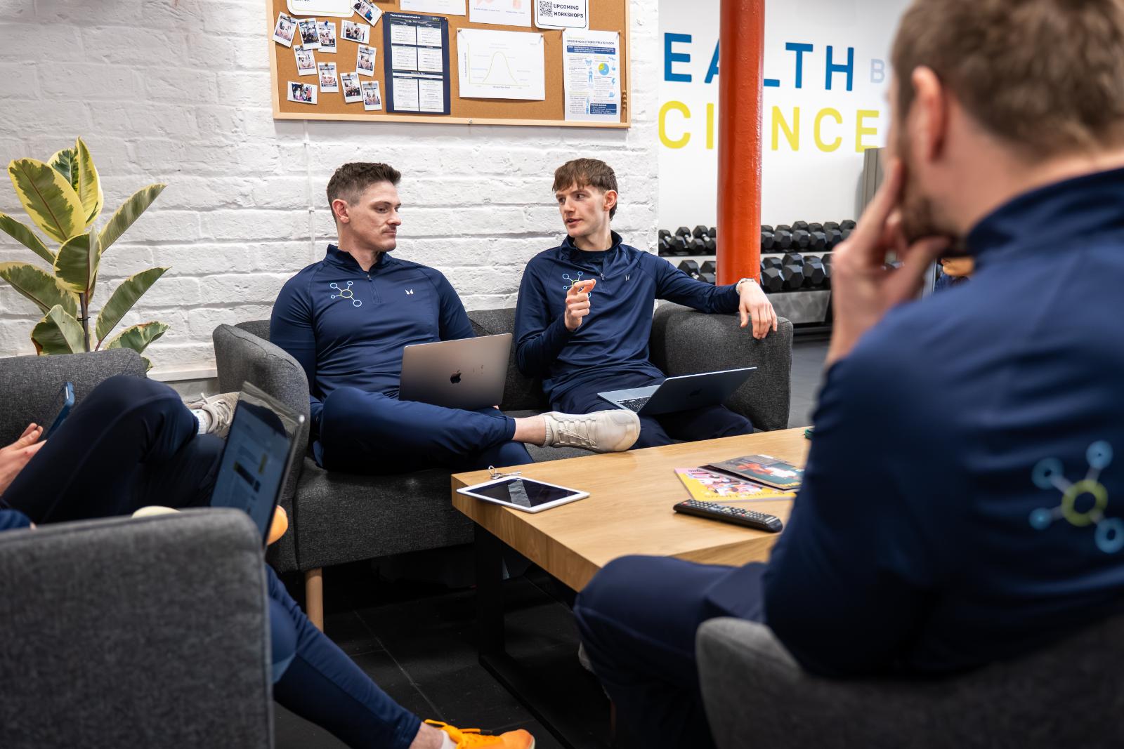 Senior specialists at Health by Science discussing clinical exercise progressions for personal training Edinburgh programmes in Leith.