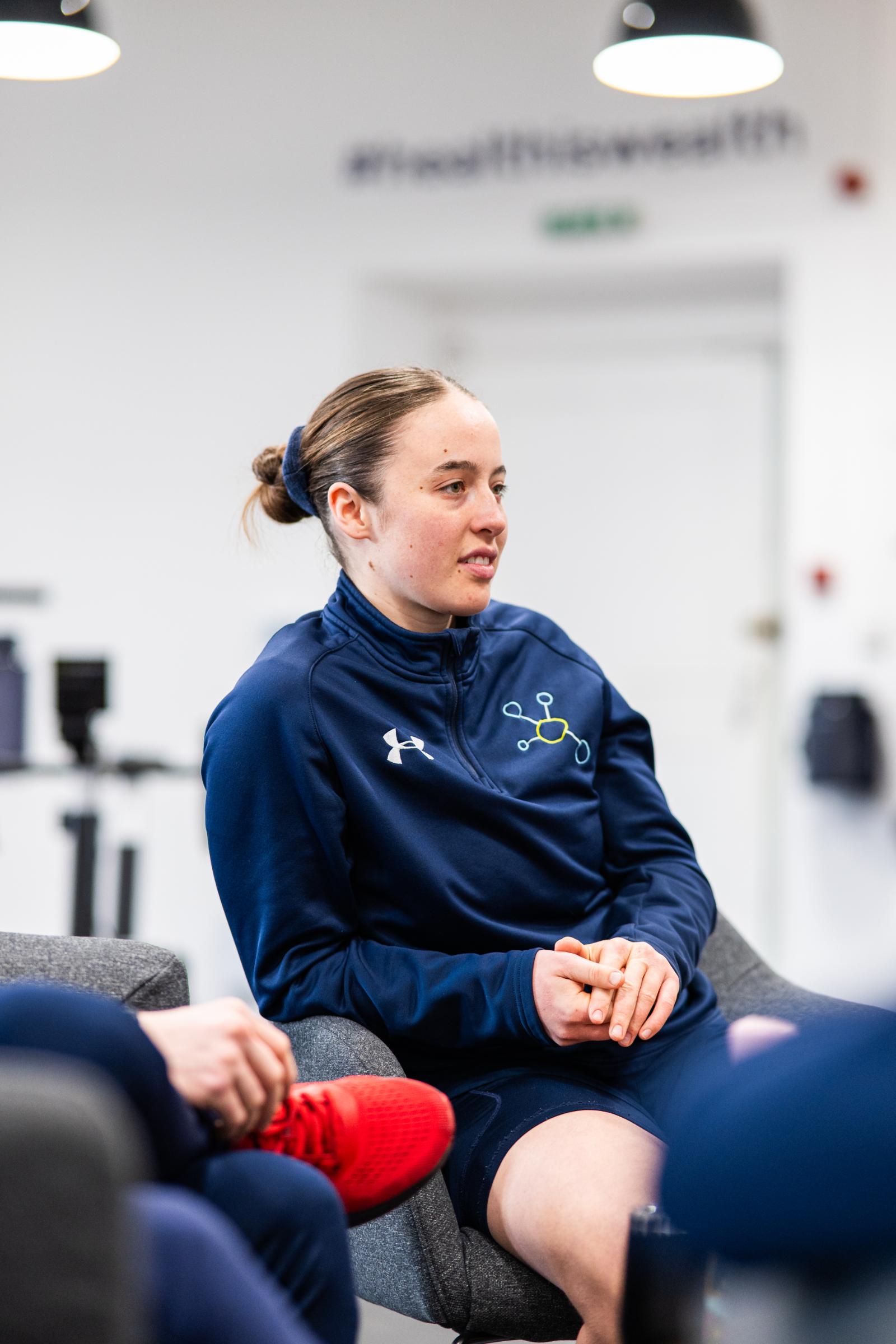 Health by Science specialist participating in a clinical team workshop to review evidence-based personal training Edinburgh standards.