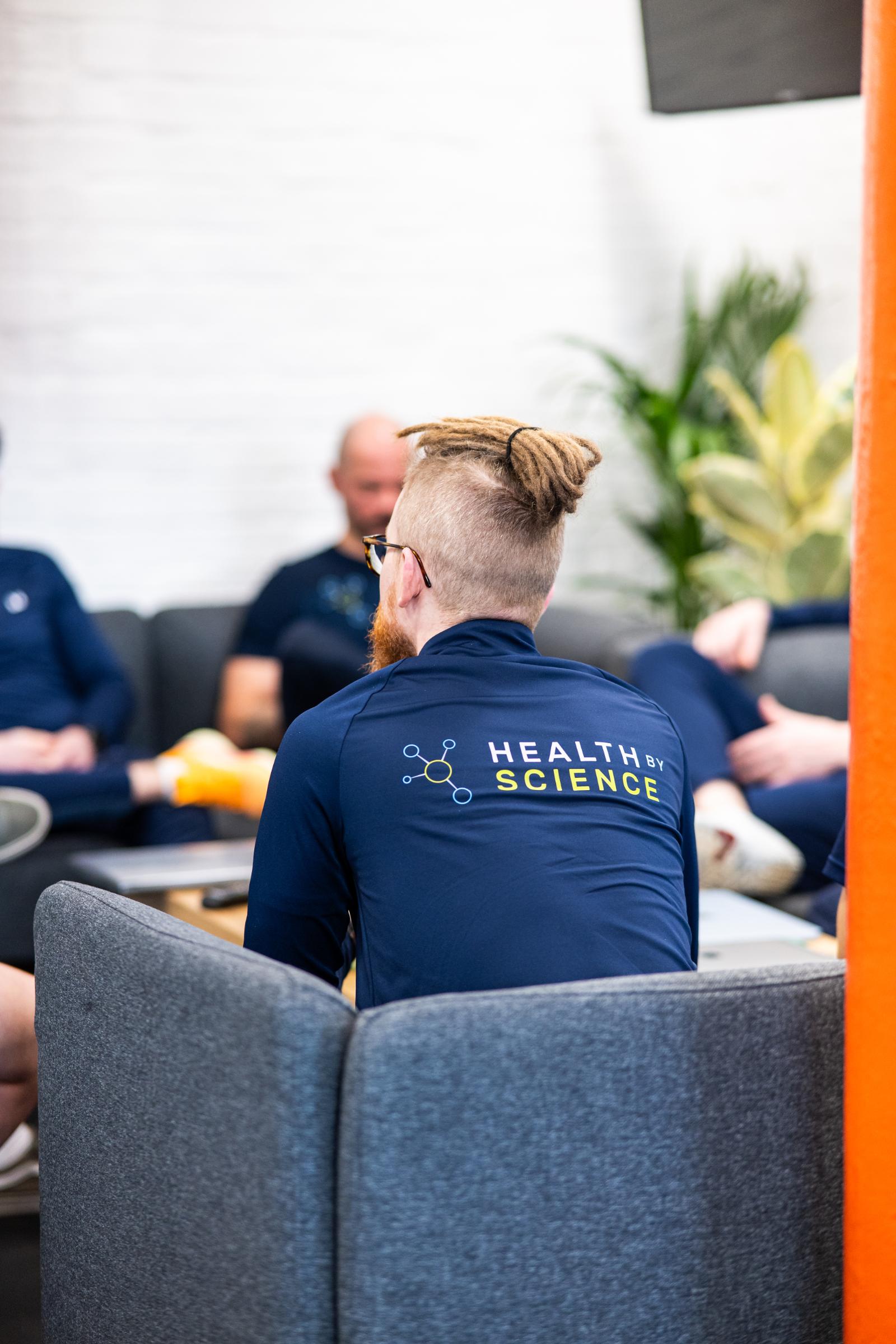 Health by Science team of experts collaborating on multidisciplinary patient care plans for clinical personal training Edinburgh.