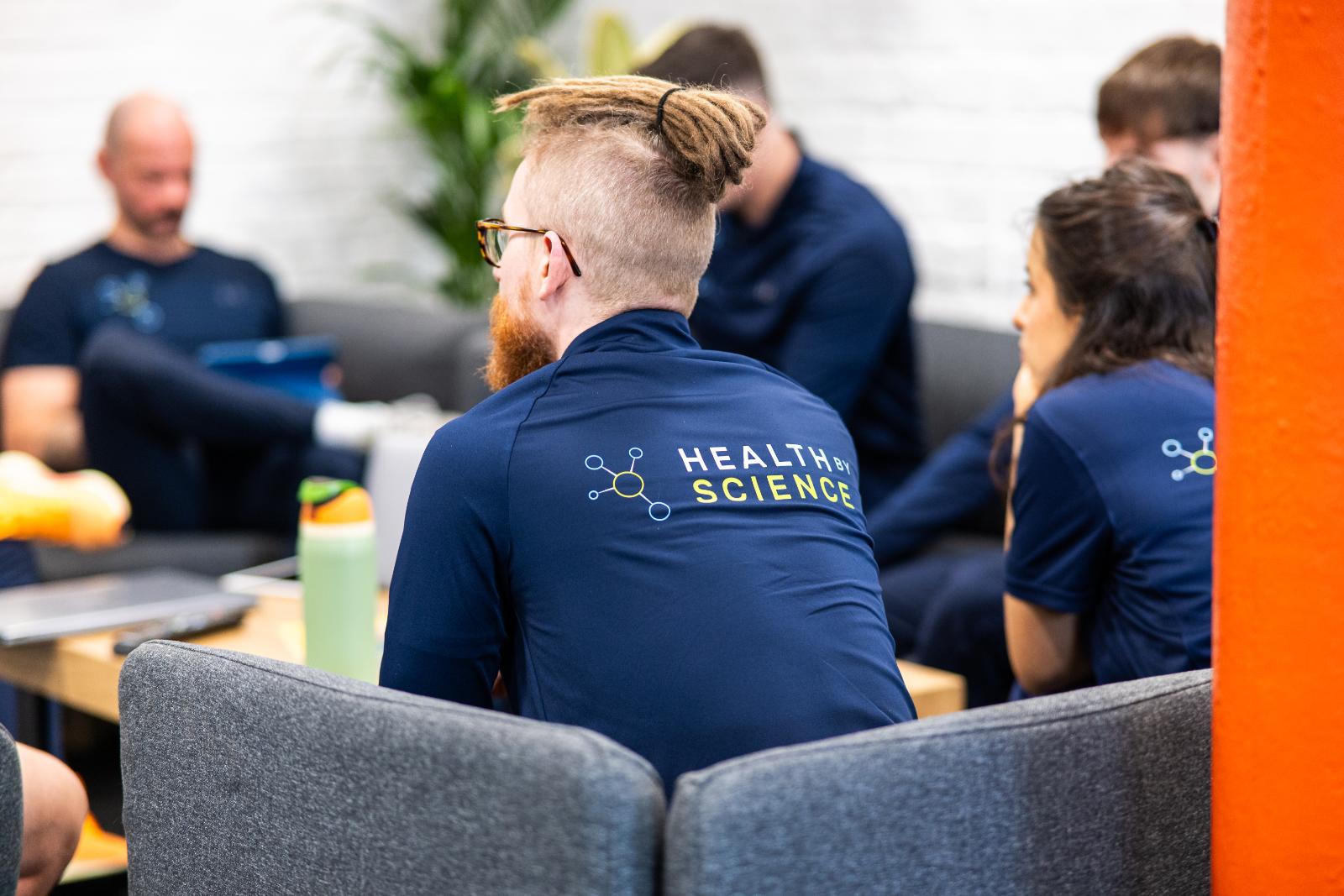 Multidisciplinary team meeting at Health by Science Leith to coordinate patient care and personal training standards.