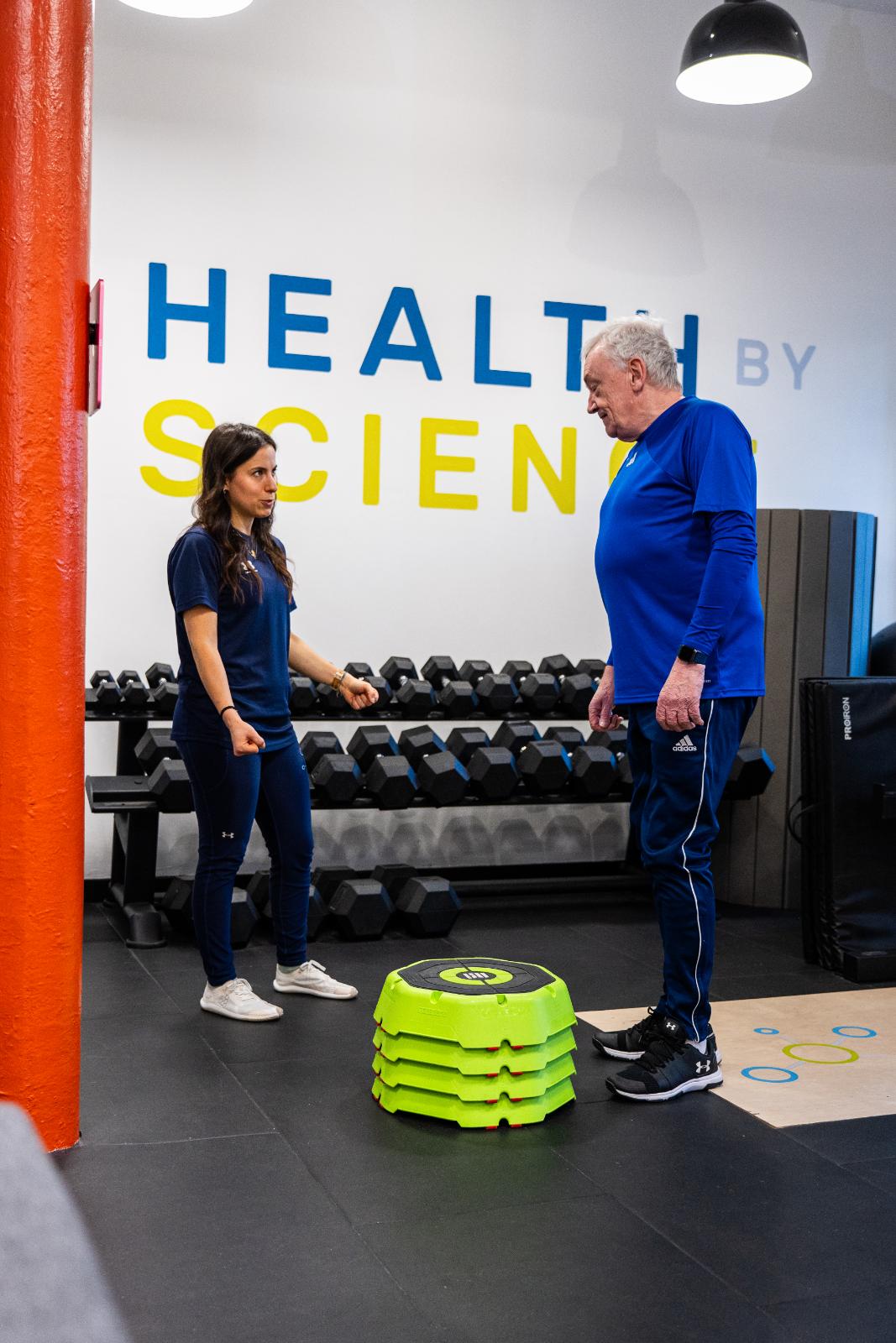 Personal training edinburgh consultation and movement instruction for stepping exercises at our specialised clinical gym facility in Leith.