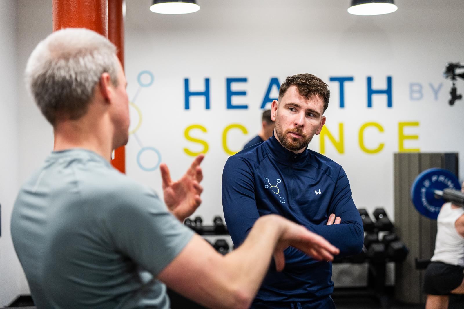 Professional consultation between a Health by Science practitioner and client regarding evidence-based injury rehabilitation goals.