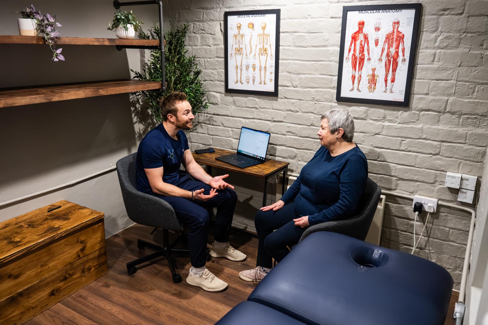 Health by Science specialist providing empathetic clinical guidance to a patient within our specialised Leith consultation room.