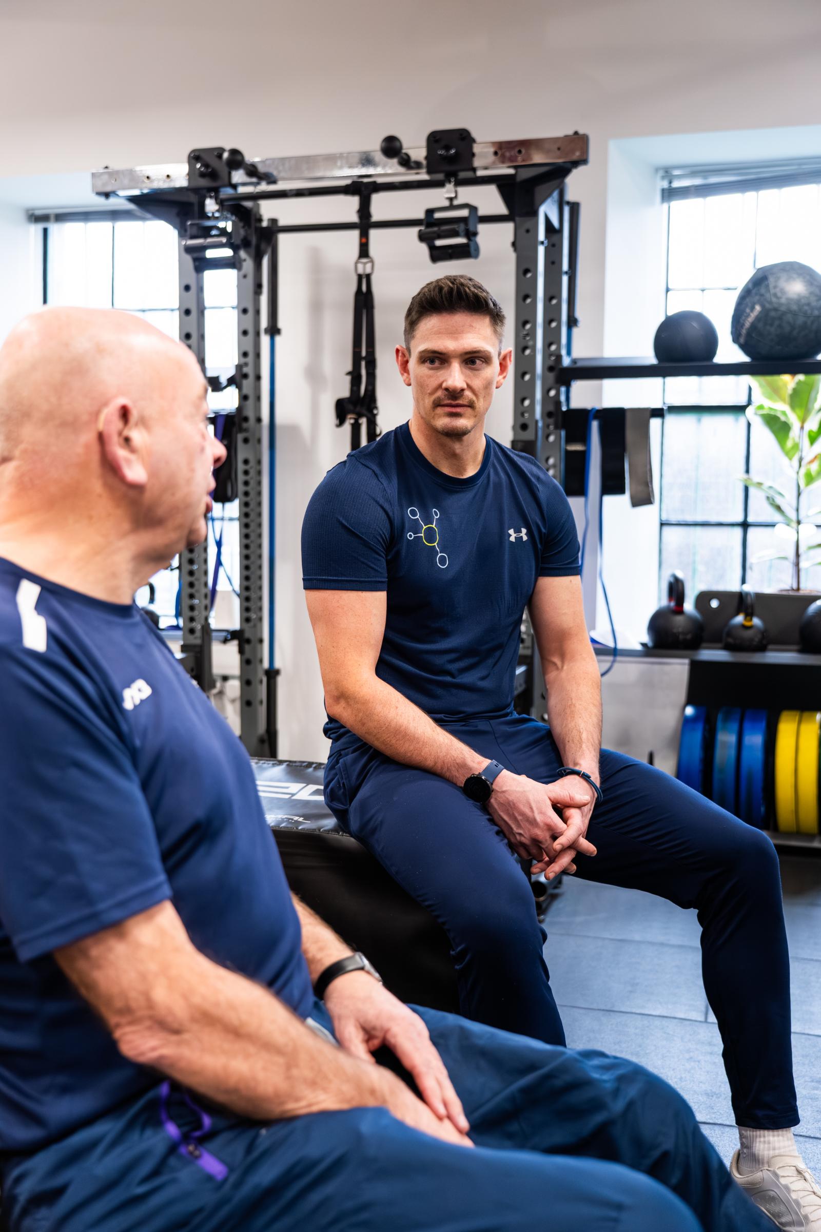 Professional consultation and goal-setting session between a Health by Science specialist and a client in our Leith facility.
